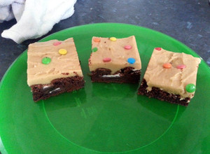 A picture of Oreo Brownies with Cookie Dough Frosting.