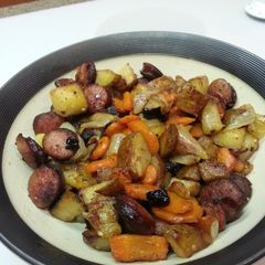 A picture of Kalbasa, potatoes, carrots and onions.