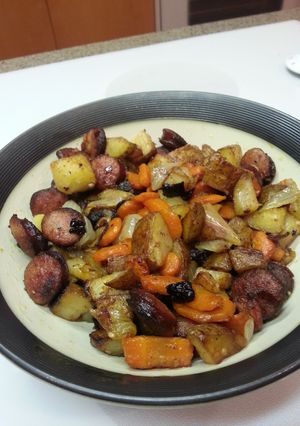 A picture of Kalbasa, potatoes, carrots and onions.