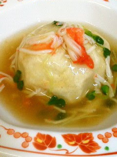 A picture of Taro Root Dumpling with Imitation Crab Meat Sauce.