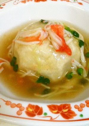 A picture of Taro Root Dumpling with Imitation Crab Meat Sauce.