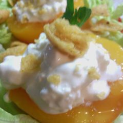 A picture of sunshine's cottage cheese stuffed peaches.