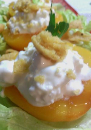 A picture of sunshine's cottage cheese stuffed peaches.