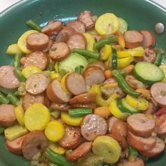 A picture of Chedder Wurst with Vegetable Medley.
