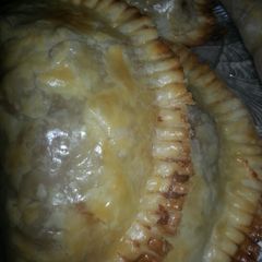 A picture of Baked Beef and Chicken Empanatas.
