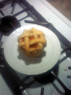 A picture of Apple pie baked in apple.