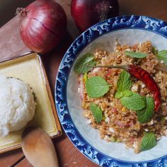 A picture of Thai Laab with chicken breast and quinoa.