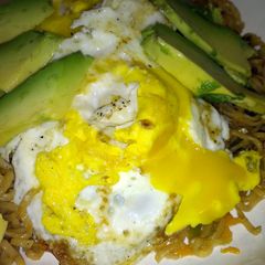 A picture of egg noodle top ramen with healthy additions.