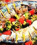 Mackerel in sour cream, with broccoli and tomatoes, in the oven