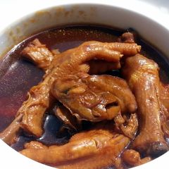 A picture of Dried Oyster And Chicken In Wine Stew.