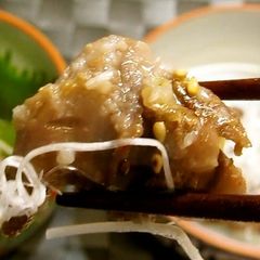 A picture of Chicken Gizzards Panfried with Leek-Salt Sauce.