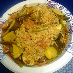A picture of Sweet and sour trotters with asparagus and zucchini.