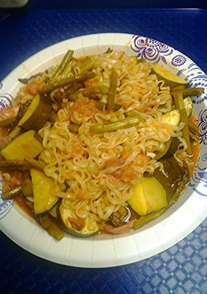 A picture of Sweet and sour trotters with asparagus and zucchini.