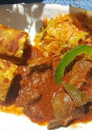 A picture of Stewed Liver, Cabbages and Chappattis.