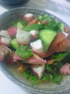 A picture of Octopus and Cucumber Salad with Lemon Dressing.