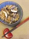 Japanese ”Kinoko Takikomi Gohan” the Rice cooked with Soy Sauce and Mushrooms