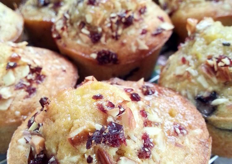 Orange and Almond Muffins with Orange Almond Syrup and a Almond and cranberry topping