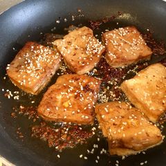 Pan Fried Smoked Tofu With Garlic & Sesame A picture of Pan Fried Smoked Tofu With Garlic & Sesame.