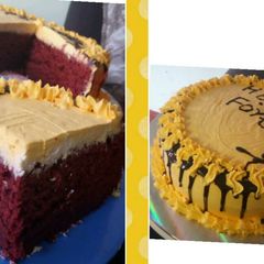 A picture of Red velvet cake with a chocolate ganache cream frosting.