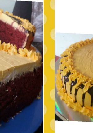 A picture of Red velvet cake with a chocolate ganache cream frosting.