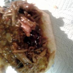 A picture of pulled pork sandwich.