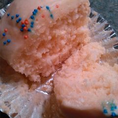 A picture of Orange cream soda can cupcakes.