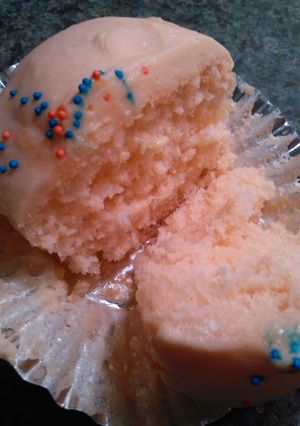 A picture of Orange cream soda can cupcakes.