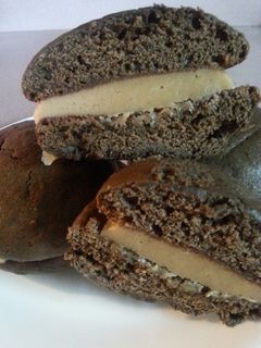 A picture of Chocolate Peanut Butter Buttercream " Whoopie " Pies.
