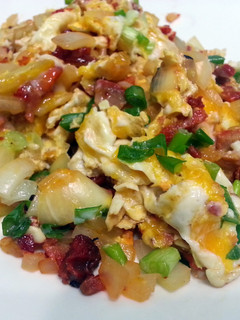 A picture of LG SCRAMBLED EGGS WITH BBQ PORK.