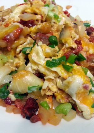 A picture of LG SCRAMBLED EGGS WITH BBQ PORK.