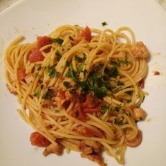 Spaghetti with octopus and fresh tomato sauce A picture of Spaghetti with octopus and fresh tomato sauce.