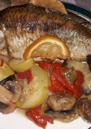 O poză a rețetei Peste cu legume la cuptor🐟🍋🌶🥒🍄.