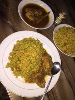 A picture of Fried rice with chicken pepper sauce.