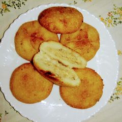 A picture of Stuffed Kakara Pitha.