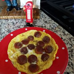 Scrambled egg with hotdogs 🌭🍳 A picture of Scrambled egg with hotdogs 🌭🍳.