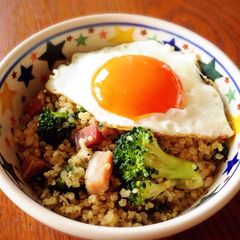 A picture of Quinoa in a Bowl with Soft-Set Fried Eggs.