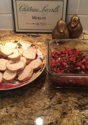 A picture of Tomato, Basil And Balsamic Glaze Bruschetta.