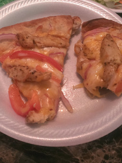 A picture of Chicken fajitas pizza.