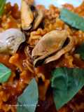 Mafalda corta en salsa de mejillones en escabeche