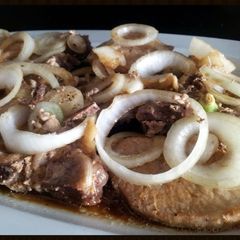 A picture of AMIEs PORK STEAK.