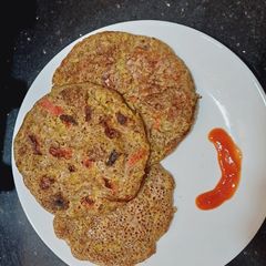 A picture of Veggies Ragi uttapam.