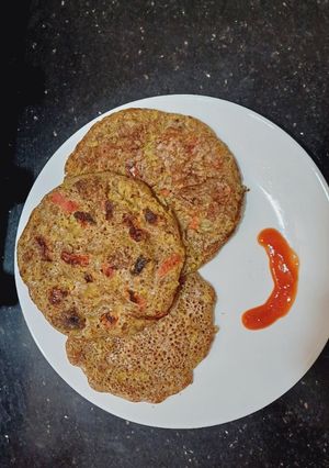 A picture of Veggies Ragi uttapam.