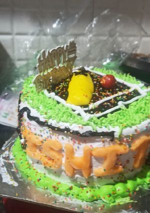 A picture of Cricket pitch cake with fruit flavour.
