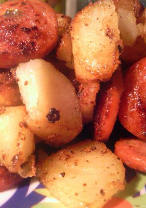 A picture of potatoe and sausage.