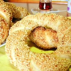 A picture of Simit: Turkish Bread Rings Coated with Sesame Seeds.