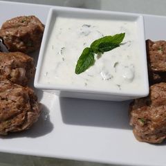 Spicy lamb meatballs with a tangy yoghurt sauce A picture of Spicy lamb meatballs with a tangy yoghurt sauce.