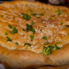 A picture of Chicken stuffed naan.