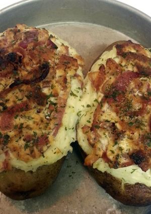 A picture of Twice Baked Potatoes with Goat Cheese, Carmalized Onions and Bacon.