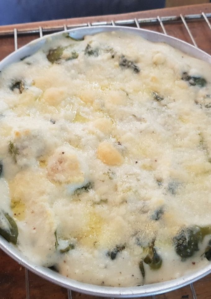 Una foto de Repollitos de bruselas con salsa blanca y queso gratinado