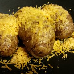 A picture of Cheesy Hasselback Potatoes.